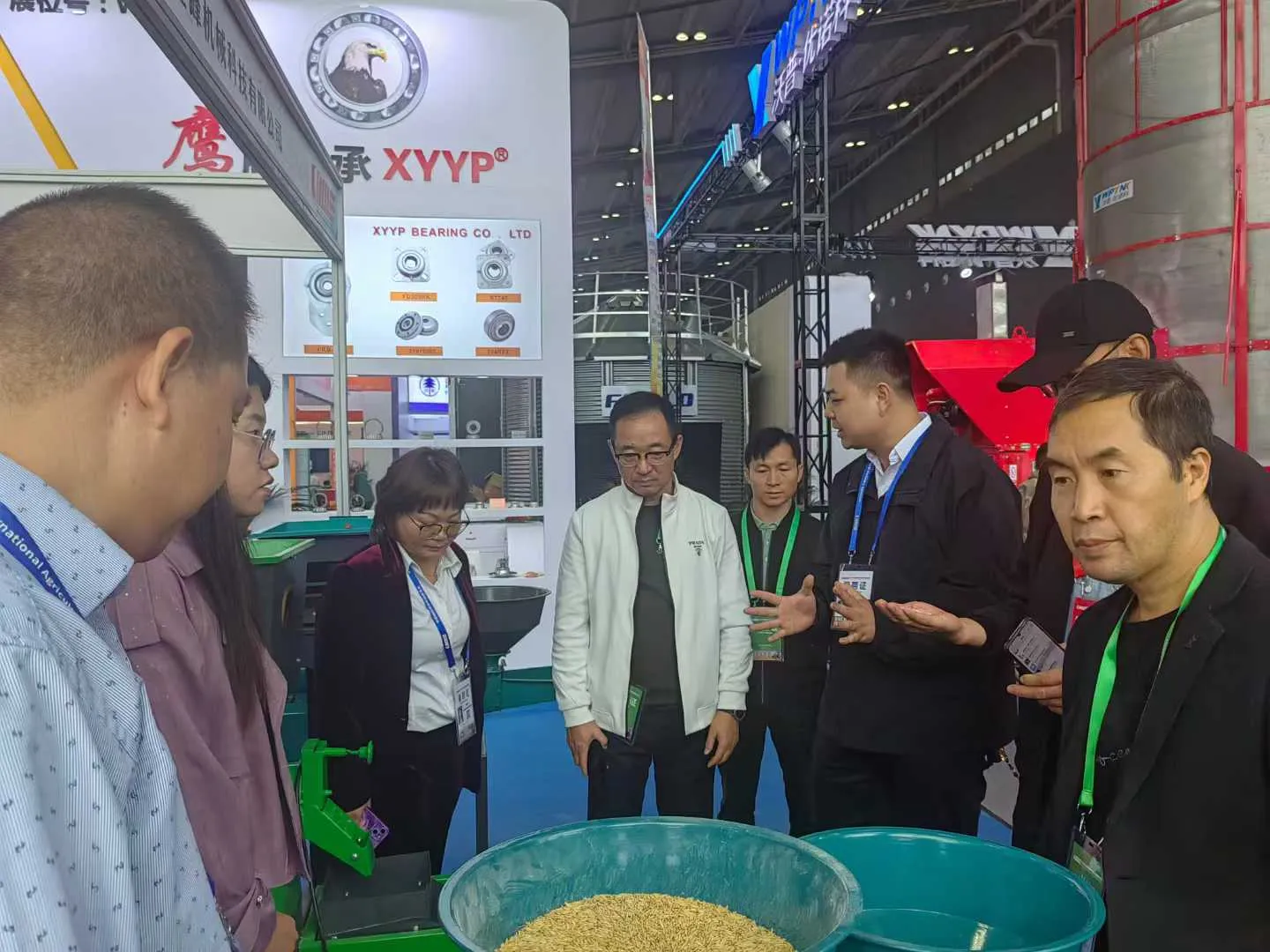 Customer discussions at the agricultural machinery exhibition